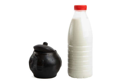 Jug and bottle with milkの写真素材