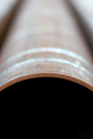 close up abstract of a large, rusty steel pipeの写真素材