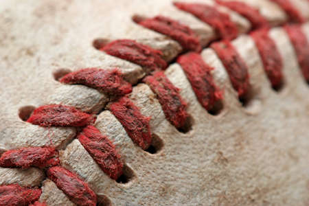 baseball macro abstract with shallow depth of field and focus near the bottom left cornerの写真素材