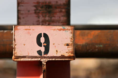 number 9 spray painted on steel structureの写真素材