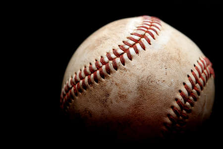 used baseball macro over black, shallow depth of fieldの写真素材