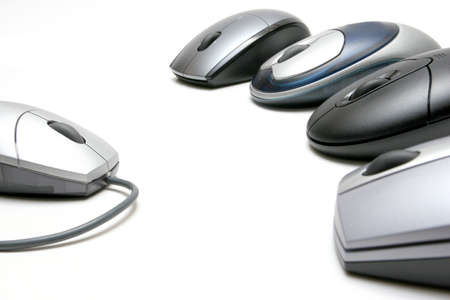 wireless mice - four wireless mice, revolution against the old and outdated corded models. highkey shot over white, focus on left mouse.の写真素材