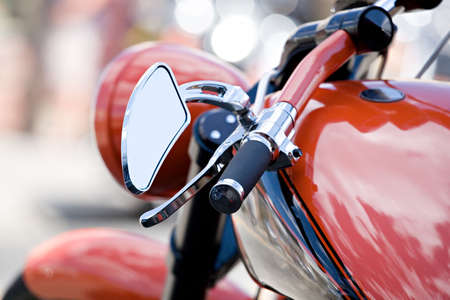 motorcycle chopper closeup - shallow depth of field with focus on end of handlebars.の写真素材
