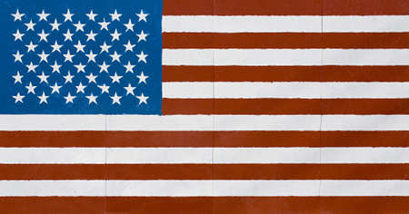 american flag - large flag in grunge look as painted on a wallの写真素材