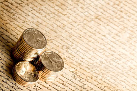 US dollar coins on constitution, macro with limited dofの写真素材