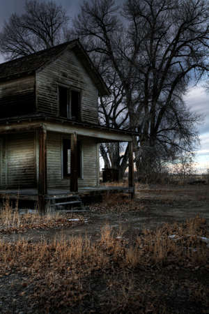 haunted house (so I was told) in rural Wyoming, long abandoned. A dark, moody HDR image.の写真素材