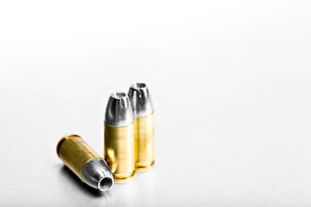 bullets 9mm macro on brushed metal surfaceの写真素材