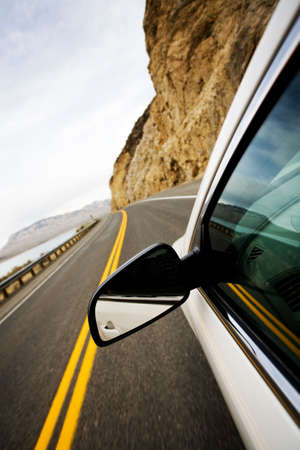 drive through mountains countryside, focus on mirror