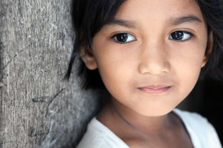 Asian girl portrait - looking to side. Manila, Philippines.の写真素材