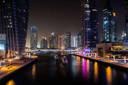 A long exposure by night at the dubai marinaのeditorial素材
