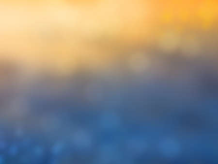 Blurred orange-blue background with bokeh