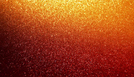 Shiny red and yellow glitter gradient texture backgroundの写真素材