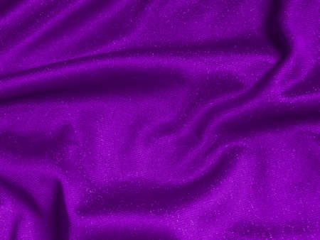 Shiny purple crumpled fabric texture. Elegant wavy cloth backgroundの写真素材