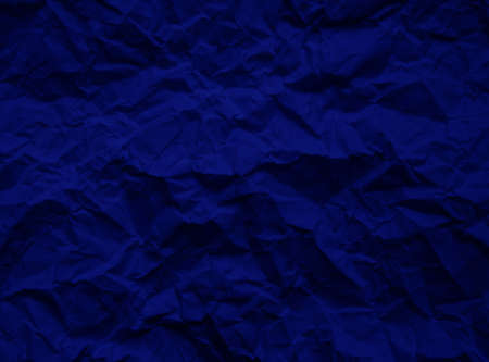 Blue crumpled paper texture backgroundの写真素材