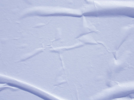 Light blue wet crumpled paper texture backgroundの写真素材