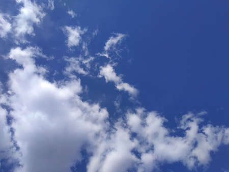 White clouds on blue sky background