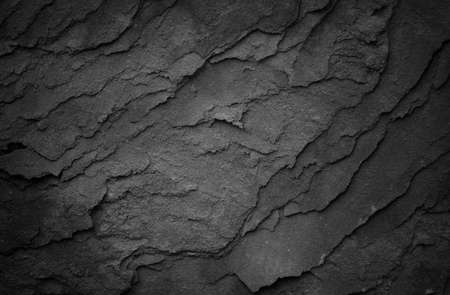 Gray rough stone background. Dark grunge shale textureの写真素材