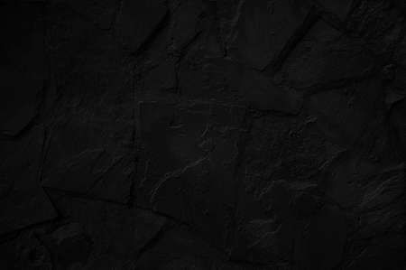 Black stone textured wall. Grunge backgroundの写真素材