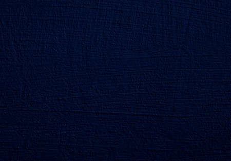 Dark blue grunge surface with rough brush strokesの写真素材