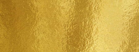 Gold foil texture background with highlights and uneven surface