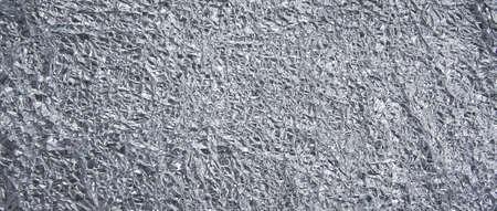 Silver aluminum crumpled foil texture