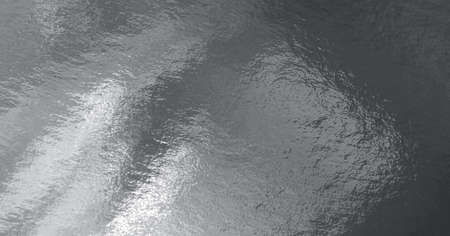 Silver foil texture background with highlights and uneven surface
