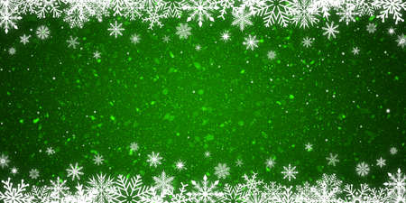 Frame of white snowflakes on a glitter green background. Christmas bannerの写真素材