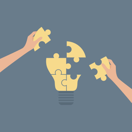 Two hands placing missing pieces on puzzle in the shape of a lamp. Vector illustration in flat styleのイラスト素材