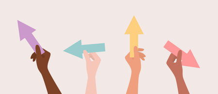 Hands of people of different nationalities and skin tones holding colorful arrows. Flat vector illustrationのイラスト素材