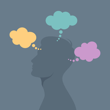 Gray male side silhouette with colored thought bubbles around, flat vector illustrationのイラスト素材