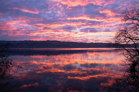 Sunset over the lakeの写真素材