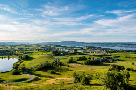 Meadow landscape with a view of Lake Zurich - Wollerau, Switzerlandの写真素材