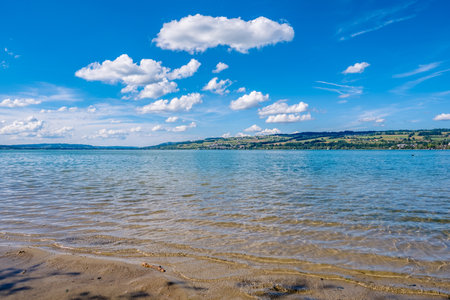 Beach and blue sky with clouds - Sempach, Switzerlandの写真素材