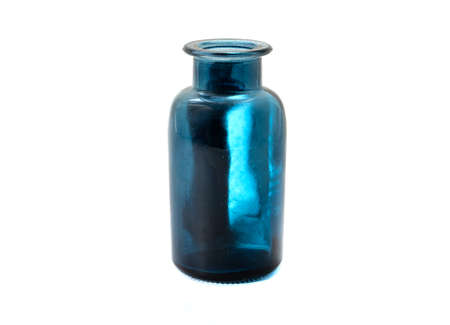 Blue glass bottle isolated on white backgroundの写真素材
