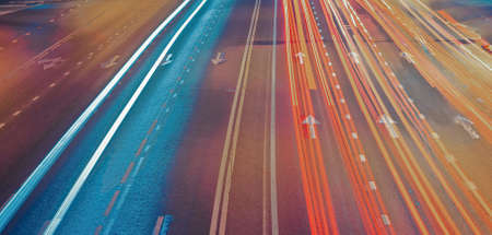 Lights of cars with night. Direction of traffic on the highway.の写真素材