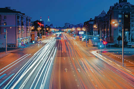 Lights of cars with night. Direction of traffic on the highway.の写真素材
