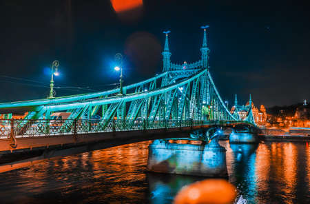 Night view of the illuminated Liberty Bridge in Budapest.の写真素材