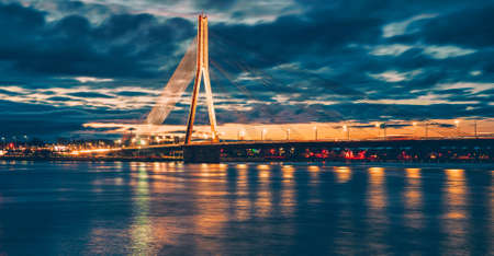 Vansu Bridge across Daugava or Dvina river. Riga, Latvia night cityscape .の写真素材
