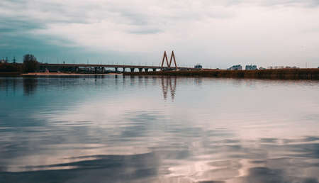 Millenium bridge in Kazan, reflected in the waters of the river Kazanka. Cable-stayed bridge across the river.の写真素材