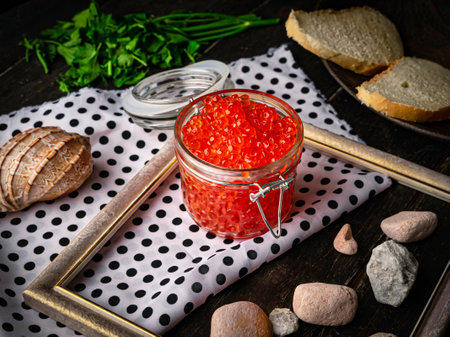 Chum salmon caviar in a glass bowl . Seafood, delicacies, healthy nutrition.の写真素材