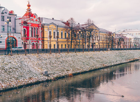 Kazan cityscape in winter. Reflection in the ice of a frozen river. Beautiful view of the city. Buildings on the bank of the Bulak ductの写真素材