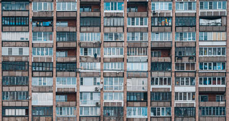 Balconies on a soviet era building. Old apartment building. Front view close up.の写真素材