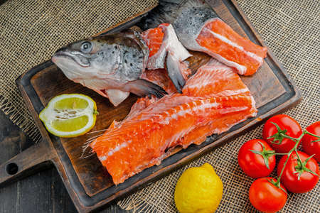 Cut salmon for soup. Head, tail, fish meat.の写真素材