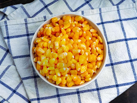 Tasty ripe corn kernels in a bowl.の写真素材