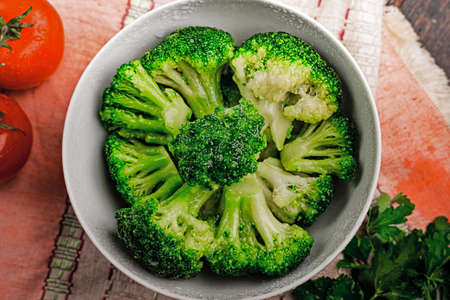 Bunches of green broccoli ready to cookの写真素材