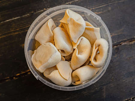Frozen russian crude pelmen or dumplings. Close up.の写真素材