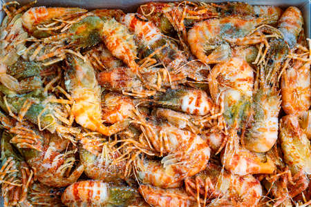 Fresh frozen Greenland prawns in a box.の写真素材