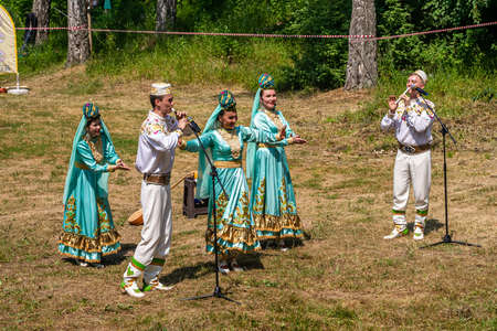 Kazan, Russia, June 26 2021. The Tatar ethnic holiday Sabantui, end of field works. Performance of Tatar songs.のeditorial素材