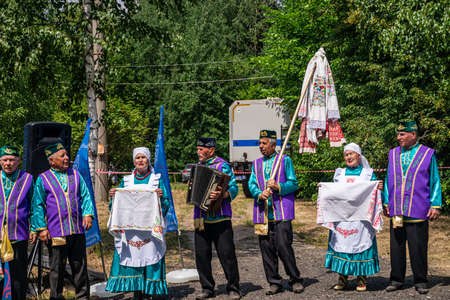 Kazan, Russia, June 26 2021. The Tatar ethnic holiday Sabantuy, end of field works. Traditional Tatar costume with ornamentation.のeditorial素材