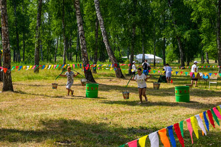 Kazan, Russia, June 26 2021. The Tatar ethnic holiday Sabantui, end of field works.のeditorial素材